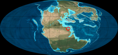איור 2: מיקומן של היבשות בכדור הארץ בתור הטריאס. ניתן להבחין ביבשת לאורסיה בצפון וגונדוונה בדרום. אוקיינוס פנתלסה מקיף את היבשות וים תטיס תחום בין היבשות הגדולות לבין שרשרת האיים במזרח. שטחה של ישראל (מסומן בעיגול אדום) ממוקם לחופו של ים תטיס בצפון יבשת אפריקה.                                                                                                                                        איור מתוך:  .Colorado Plateau Geosystems Inc
